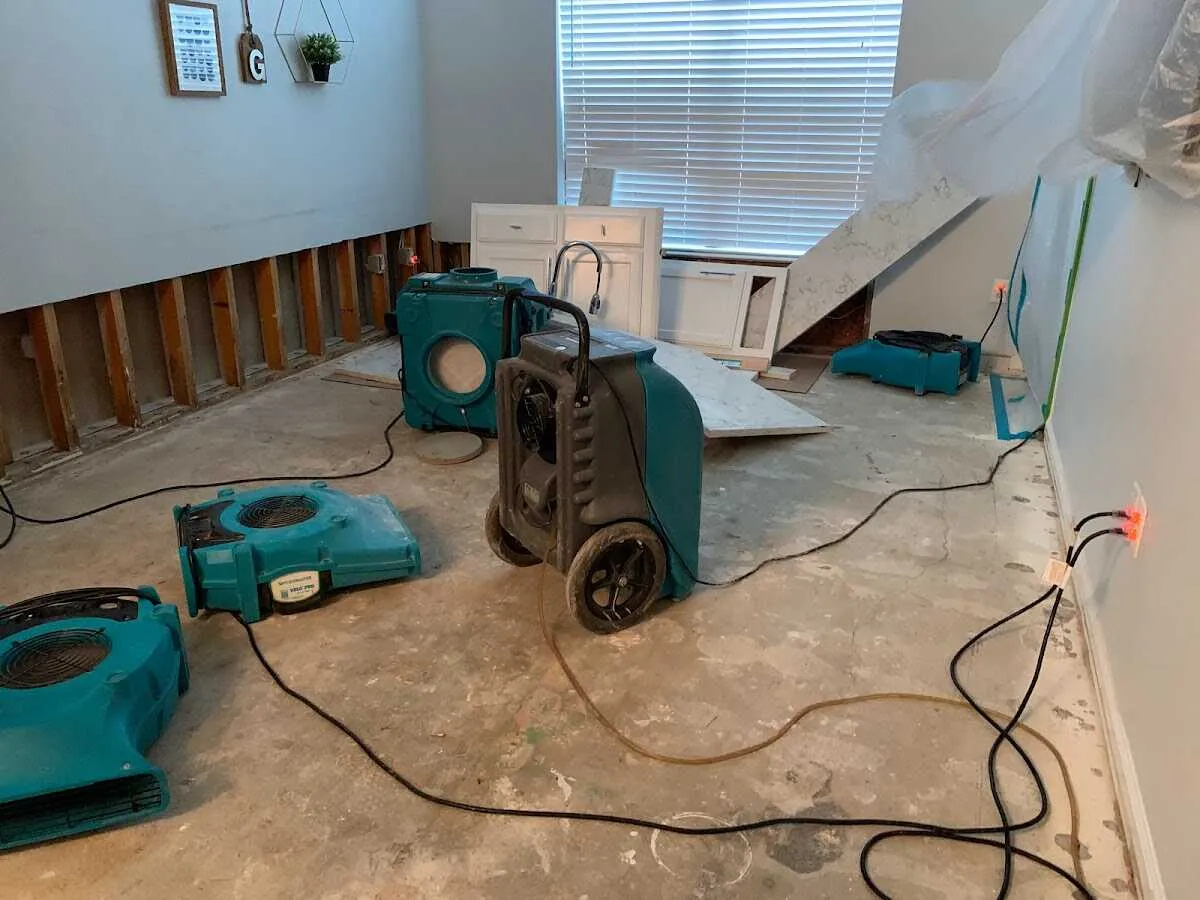 Dehumidifier in flood-cut room for Water Damage Restoration in Halfway